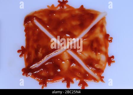red ketchup splashes isolated on white background Stock Photo