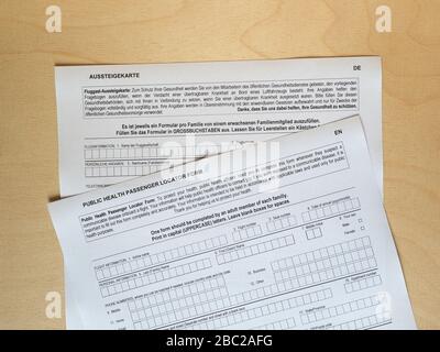 BERLIN, GERMANY - CIRCA MARCH 2020: Fluggast Aussteigekarte (translation:  Passenger Locator Form) Stock Photo