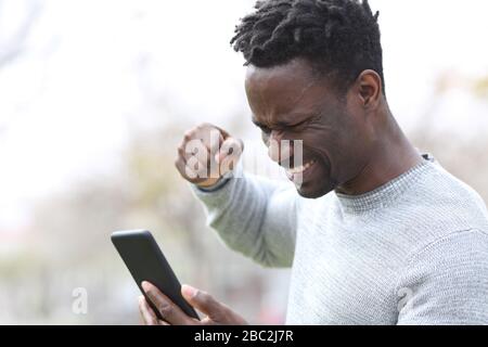 Frustrated young man angry at his wifi router modem at work Stock Photo ...