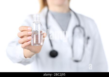 Front view close up of doctor woman showing hand sanitizer gel isolated on white background Stock Photo