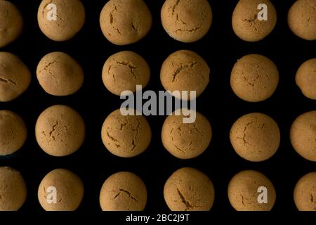 Homemade honey cookies on a black background Food pattern concept Stock Photo