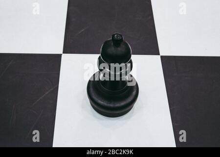 mannequins from chess game on black and white squares Stock Photo