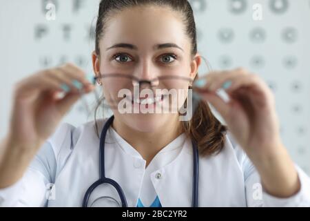 Happy pretty woman with stethoscope Stock Photo