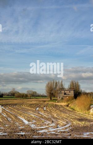 Old shed along the river Giessen Stock Photo