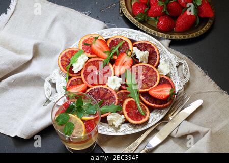 Salad with red oranges, cheese and arugula Stock Photo