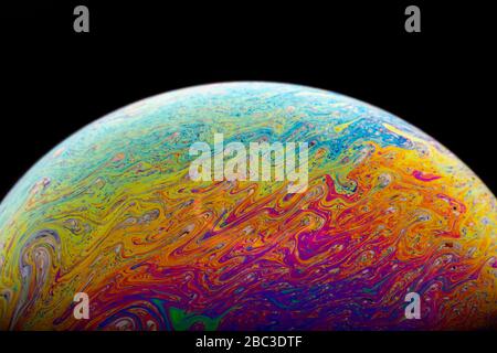 Macrophotograph of a colorful soap bubble Stock Photo