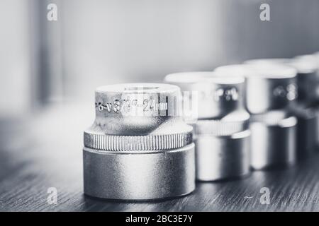 Set of new socket wrenches in a workshop Stock Photo