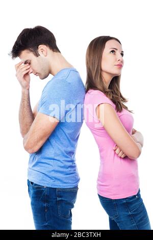Unhappy couple standing back to back Stock Photo