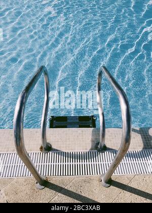 Close up of swimming pool ladder Stock Photo