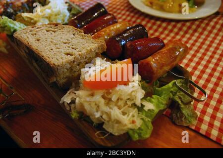 Bread and wurst at typical restaurant in Wien Stock Photo