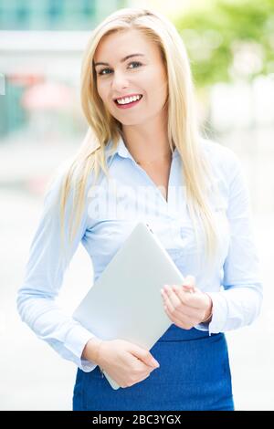 Young businesswoman smiling Stock Photo