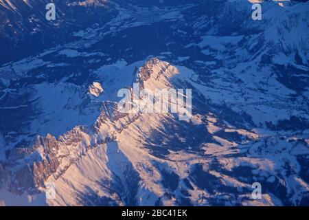 Aerial view of the Alps with winter snow Stock Photo