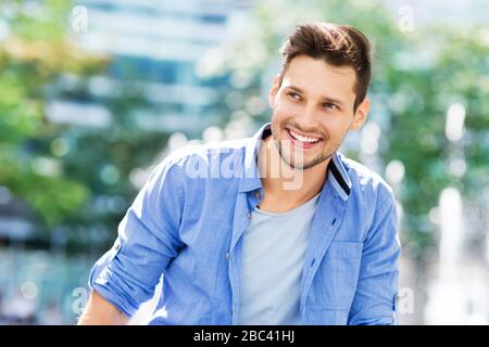 Young man smiling Stock Photo