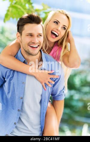 Young couple having fun outdoors Stock Photo