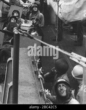 Gun crews aboard USS Phoenix (CL-46) during the Mindoro invasion, in December 1944 (535555). Stock Photo