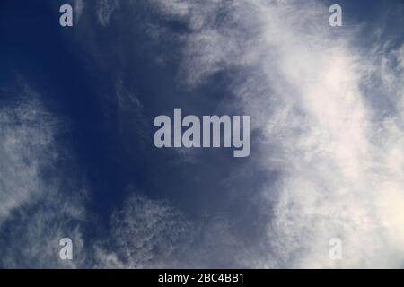Upward view into sky with various clouds. Stock Photo