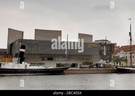 The Deutsches Auswandererhaus (German Emigration Center) museum of immigration on Columbusstrasse and the Neuer Hafen canal in Bremerhaven, Germany. Stock Photo