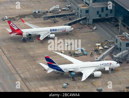 Aerial view of Sao Paulo GRU Airport terminal LATAM Dreamliner and Boeing 767. TAM will leave One World Alliance. Guarulhos Airport in Brazil. Stock Photo