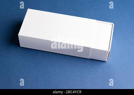 Smartphone's pull out boxes on blue surface, editable mock up template ready for your design Stock Photo