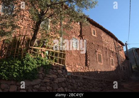 The exterior of old homes in Tacheddirt, an Amazigh Berber village in Morocco's Atlas Mountains. Stock Photo