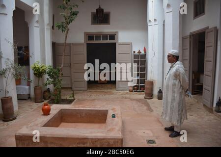 The internal courtyard of a traditional wealthy home (riad) in Marrakech medina, Morocco, seen on a walking tour with a local guide. Stock Photo