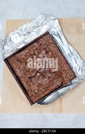 Freshly baked chocolate chewy brownie. Close up shot. Stock Photo