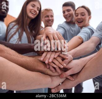 close up. a group of young people showing their unity Stock Photo