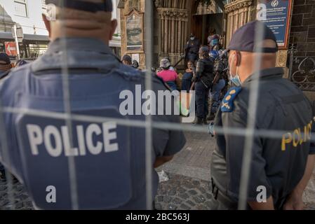 Police evict refugees from Cape Town's Central Methodists Church in South Africa after a six month occupation protesting against xenophobia