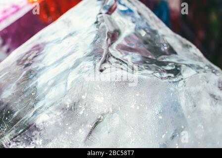 Huge blocks of clear pieces of ice one on top of the other for ice sculpture. Selective focus macro shot with shallow DOF Stock Photo