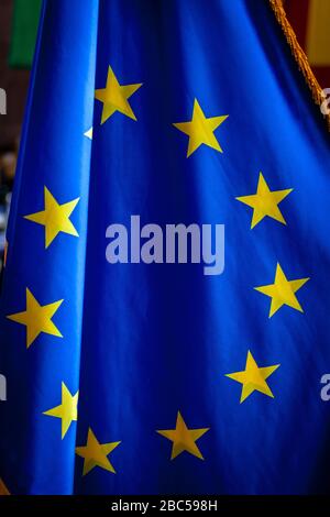 Official European Union Fabric Flag, EU flag, yellow star on blue background Stock Photo