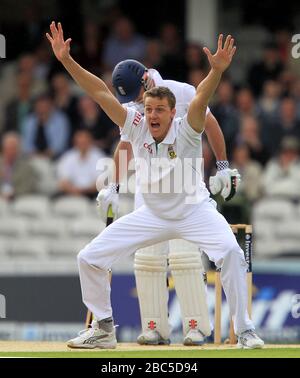 South Africa's Morne Morkel appeals successfully for the wicket of England's Andrew Strauss with the fourth ball of the match Stock Photo