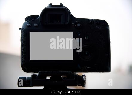 Camera on tripod Photographers take scenic views. Stock Photo