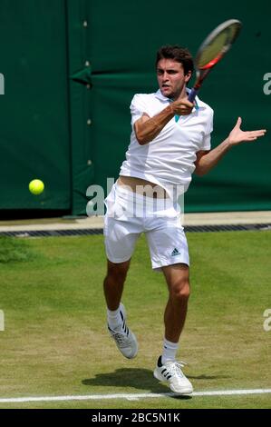 France's Gilles Simon in action against Belgium's Xavier Malisse Stock Photo