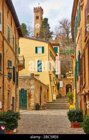 Old street and old bell tower in Santarcangelo di Romagna town, Emilia-Romagna, Rimini province, Italy Stock Photo
