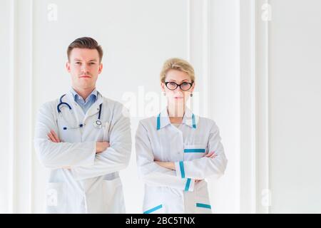 Portrait two young attractive doctors Stock Photo