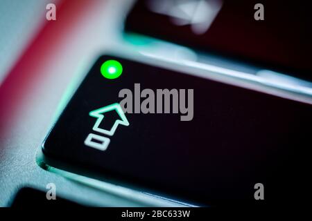 Caps Lock key on computer keyboard close up Stock Photo