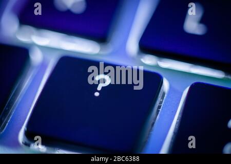 Question mark key on computer keyboard close up Stock Photo