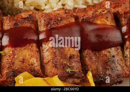 Close up of bbq grilled pork ribs with tomato ketchup Stock Photo