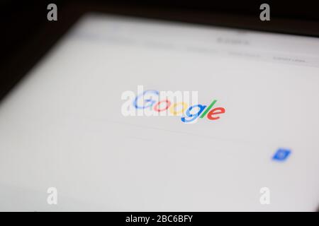 Hungary, Budapest: 10.12.2018. Google.com homepage and cursor on the screen. Google is world's most popular search engine, with phone search Stock Photo