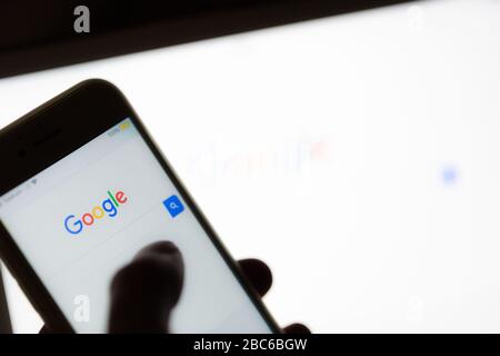 Hungary, Budapest: 10.12.2018. Google.com homepage and cursor on the screen. Google is world's most popular search engine, with phone search Stock Photo