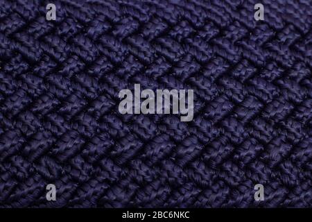 Loops on a knitted blue fabric, background or texture Stock Photo