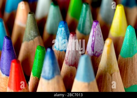 Close up of the coloured tips of a set of colouring pencils with low depth of field. Stock Photo