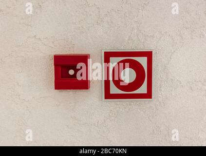 Fire alarm button in the building. Close up. Stock Photo