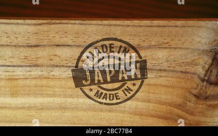 Made in Japan stamp printed on wooden box. Factory, manufacturing and production country concept. Stock Photo