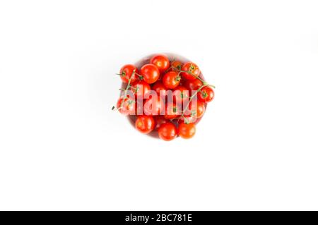 Italian red tomatoes close up food with pasta, basil leafs, cheese, isolated on white background - Top view Stock Photo