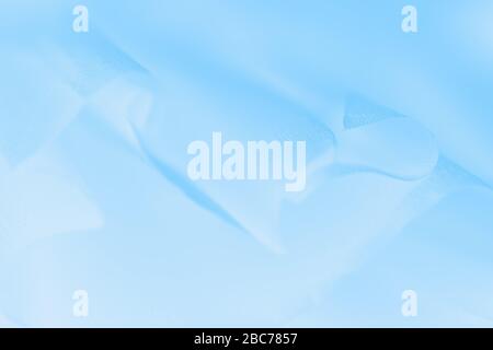 Pale delicate soft blue gradient abstract background. Fabric background Stock Photo