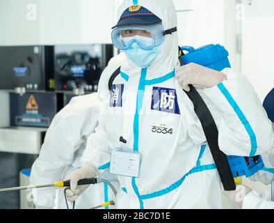 Wuhan, China. 03rd Apr, 2020. A firefighter prepares to conduct disinfection at the Terminal 3 of Wuhan Tianhe International Airport in Wuhan, central China's Hubei Province, April 3, 2020.  Wuhan, the Chinese city hardest hit by the novel coronavirus outbreak, conducted disinfection Friday on the local airport as operations will soon resume on April 8 when the city lifts its travel restrictions. Credit: Xinhua/Alamy Live News