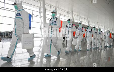 Wuhan, China. 03rd Apr, 2020. Firefighters prepare to conduct disinfection at the Wuhan Tianhe International Airport in Wuhan, central China's Hubei Province, April 3, 2020.  Wuhan, the Chinese city hardest hit by the novel coronavirus outbreak, conducted disinfection Friday on the local airport as operations will soon resume on April 8 when the city lifts its travel restrictions. Credit: Xinhua/Alamy Live News