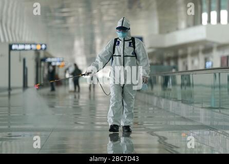 Wuhan, China. 03rd Apr, 2020. A firefighter conducts disinfection at the Wuhan Tianhe International Airport in Wuhan, central China's Hubei Province, April 3, 2020.  Wuhan, the Chinese city hardest hit by the novel coronavirus outbreak, conducted disinfection Friday on the local airport as operations will soon resume on April 8 when the city lifts its travel restrictions. Credit: Xinhua/Alamy Live News