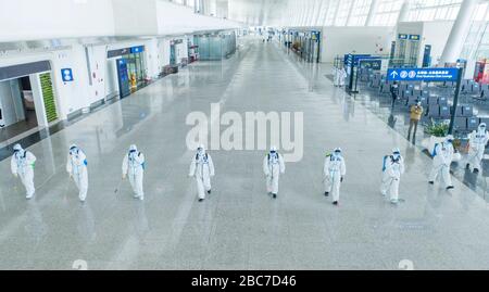 Wuhan, China. 03rd Apr, 2020. Wuhan, China. 03rd Apr, 2020. Aerial photo taken on April 3, 2020 shows firefighters conducting disinfection at the Terminal 3 of Wuhan Tianhe International Airport in Wuhan, central China's Hubei Province.  Wuhan, the Chinese city hardest hit by the novel coronavirus outbreak, conducted disinfection Friday on the local airport as operations will soon resume on April 8 when the city lifts its travel restrictions. Credit: Xinhua/Alamy Live News